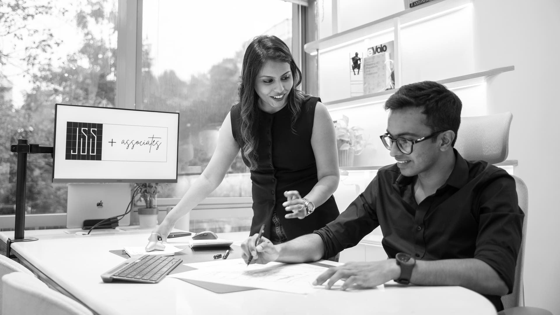 The two founders working together at a desk
